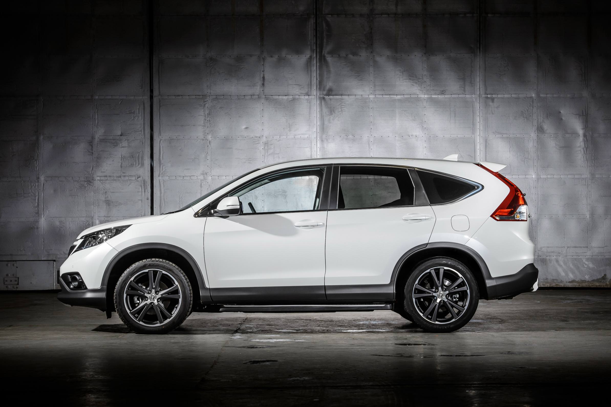 White Honda CR-V parked inside warehouse