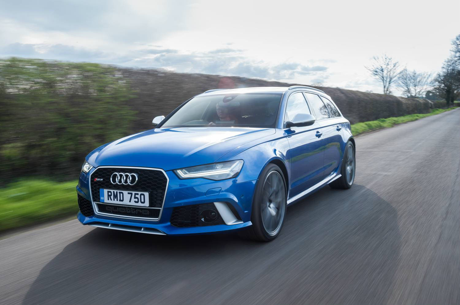 image of a blue audi rs6 quattro estate car exterior