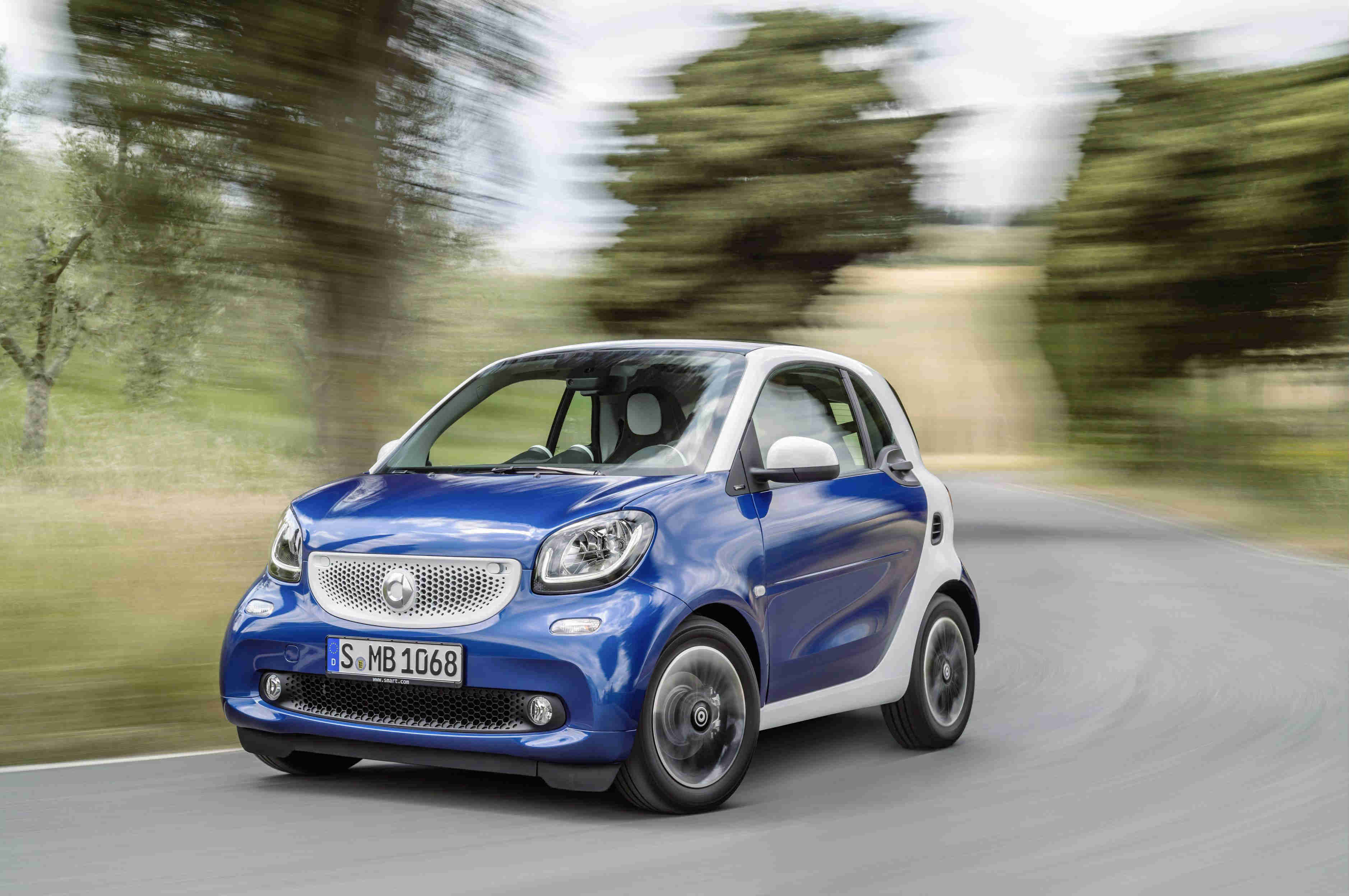 image of a blue and white smart city fortwo car exterior