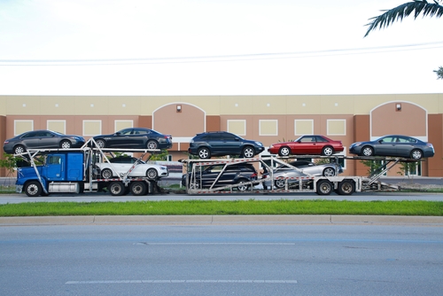 Car carrier near a business