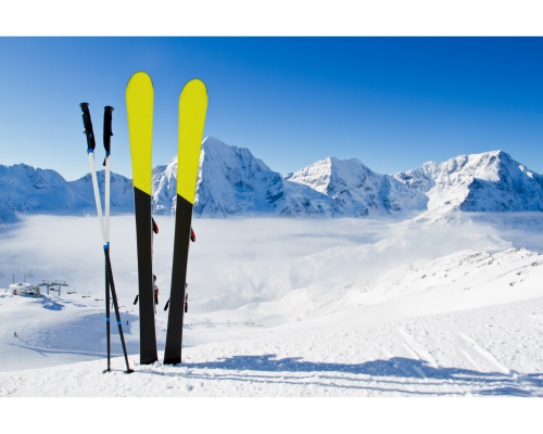 skis and poles in snow skis and poles on mountain