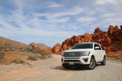 Ford car parked in desert