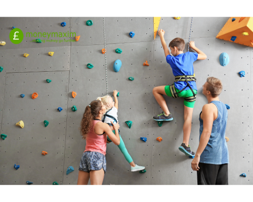 family on a climbing wall