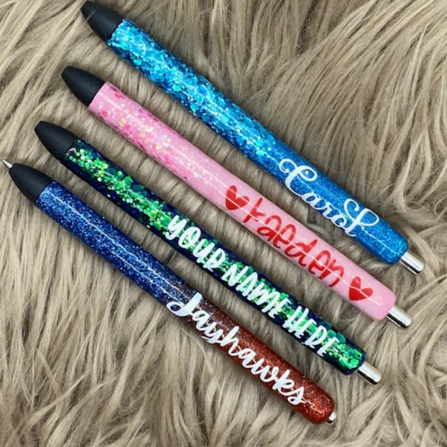 IMG_2846 Four glitter pens personalized with names.