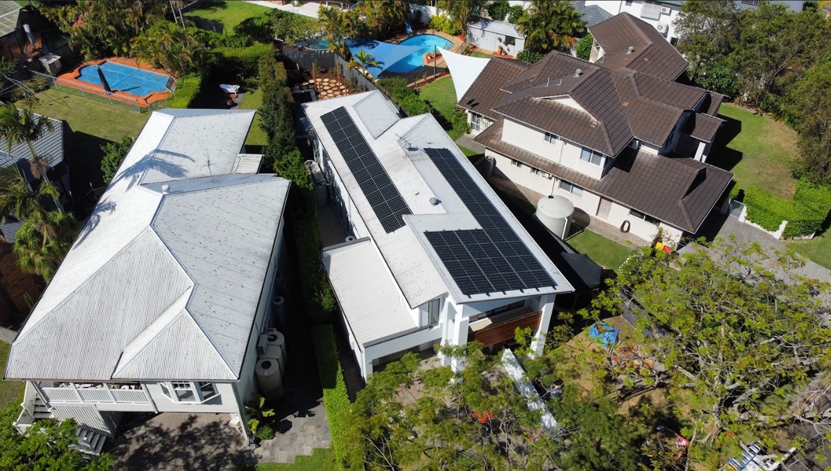Exclusive Electrical & Air installation of solar panels on a modern Brisbane home, providing sustainable and energy-efficient power solutions for residential properties.
