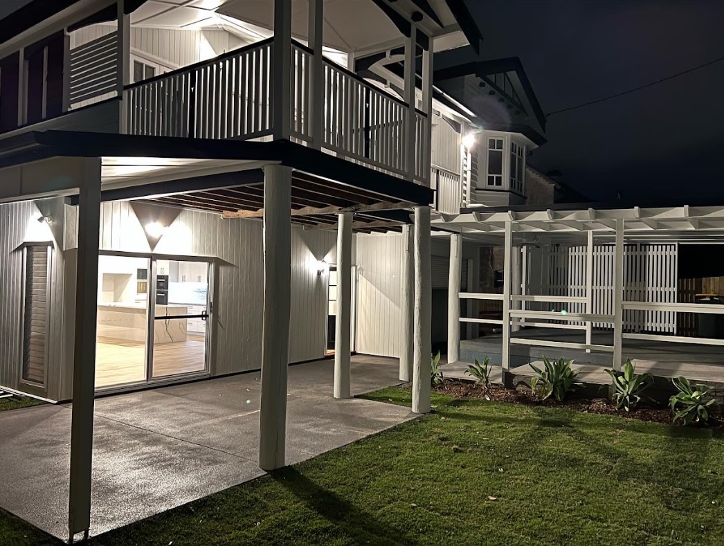 Residential property illuminated with modern outdoor wall lighting installed by Exclusive Electrical & Air, enhancing safety, style, and nighttime visibility.
