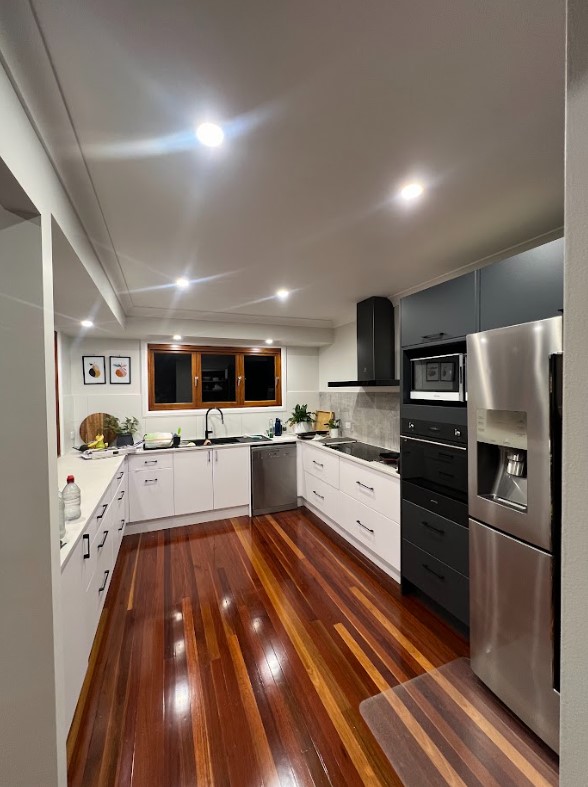 Exclusive Electrical & Air completed a sleek LED downlight installation in a modern kitchen, enhancing energy efficiency, bright illumination, and contemporary design.
