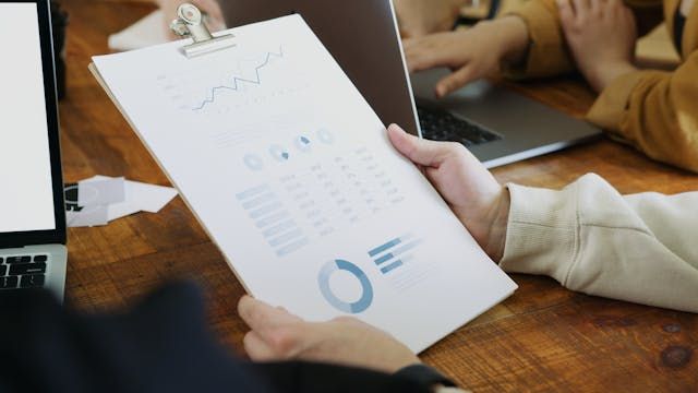 person-analyzing-charts.jpg