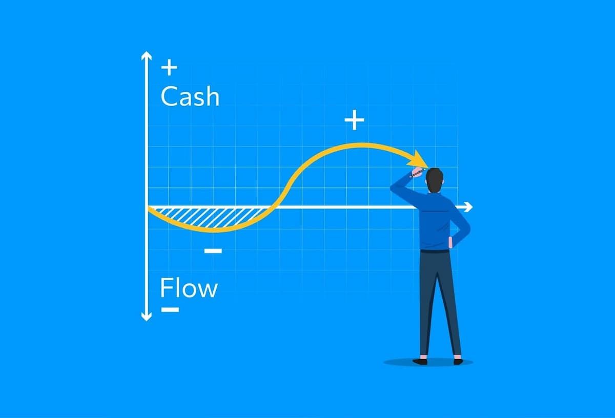 Businessman drawing cash flow graph