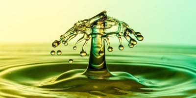 The role of soluble surfactants on the stability of two-layer flow in a channel