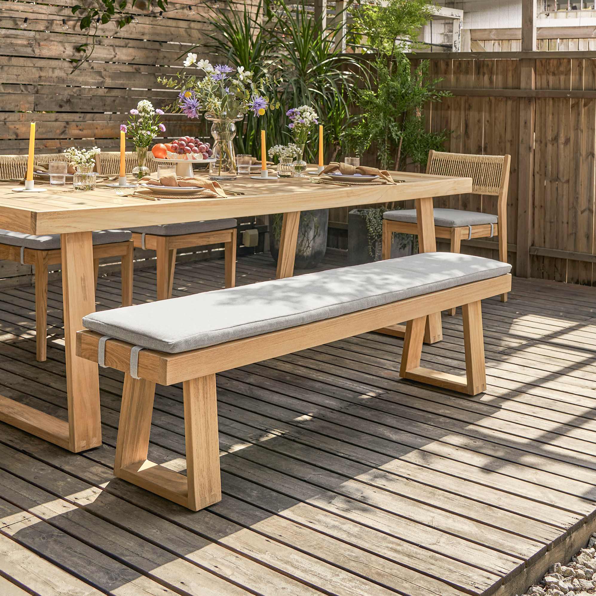 Rio Outdoor Teak Dining Bench 180cm with Ivory Cover lifestyle