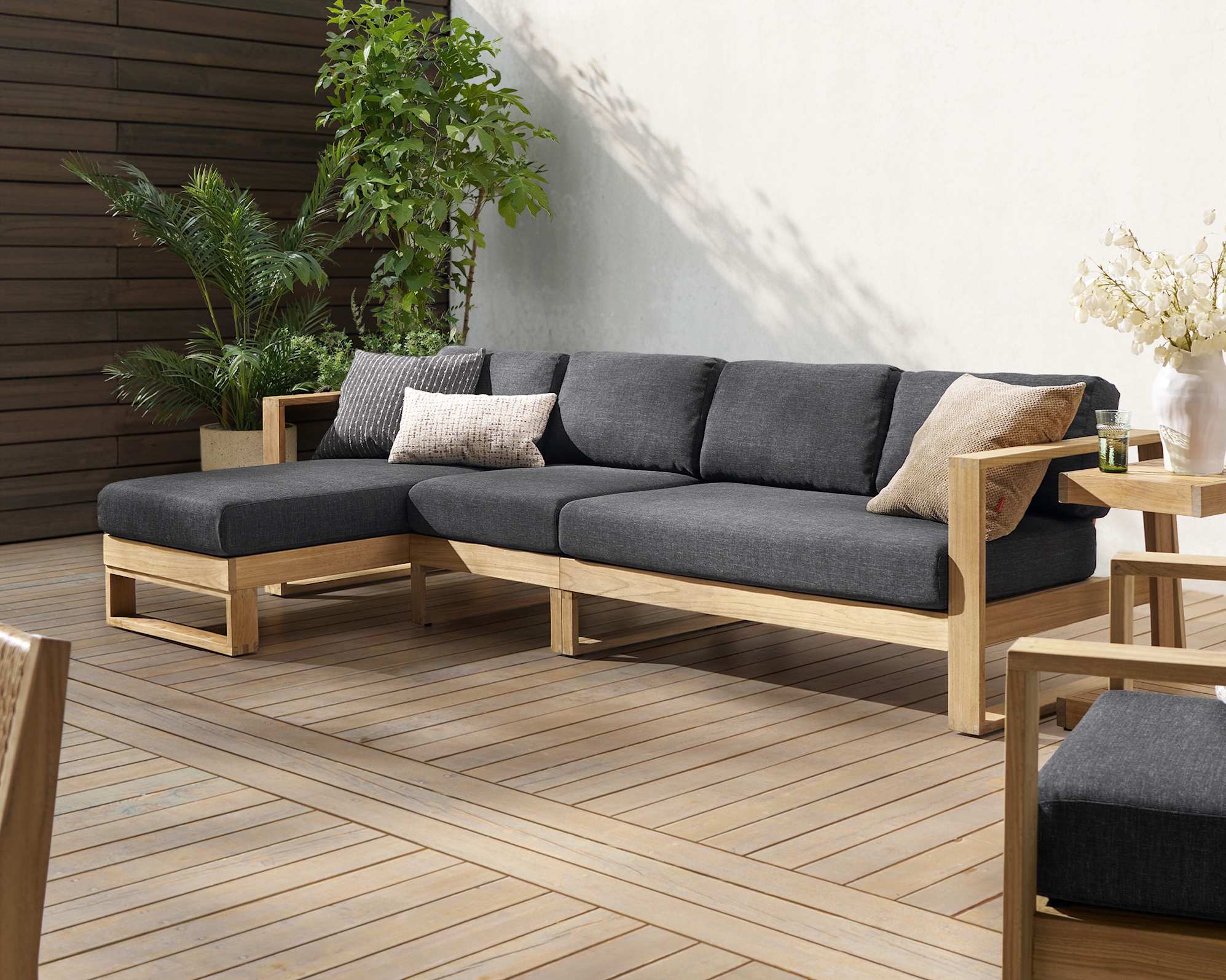 Rio Outdoor Teak Extended Chaise Sectional Sofa (Treated Version) Left Facing, Slate lifestyle