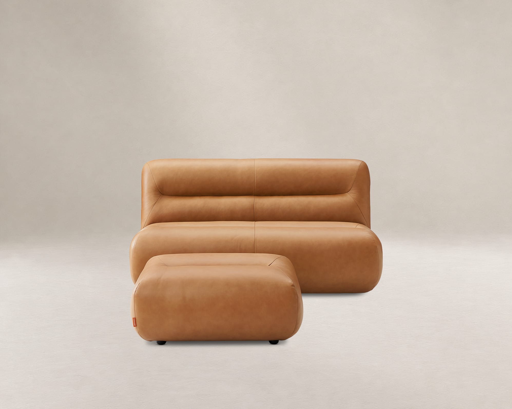 Tovi Leather 2 Seater Armless Sofa with Footstool 2
