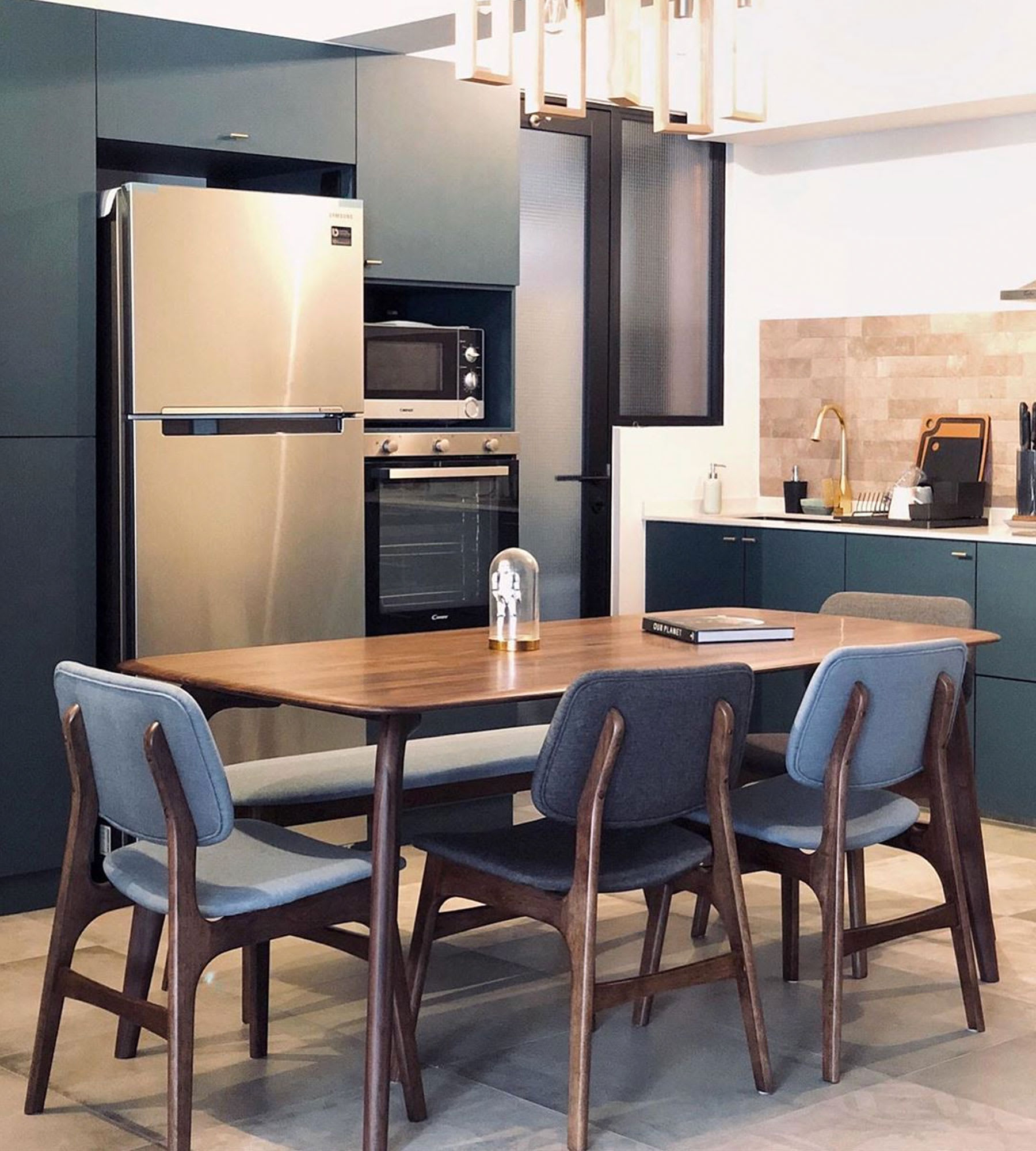 wood dining table and chairs in open-plan dining space