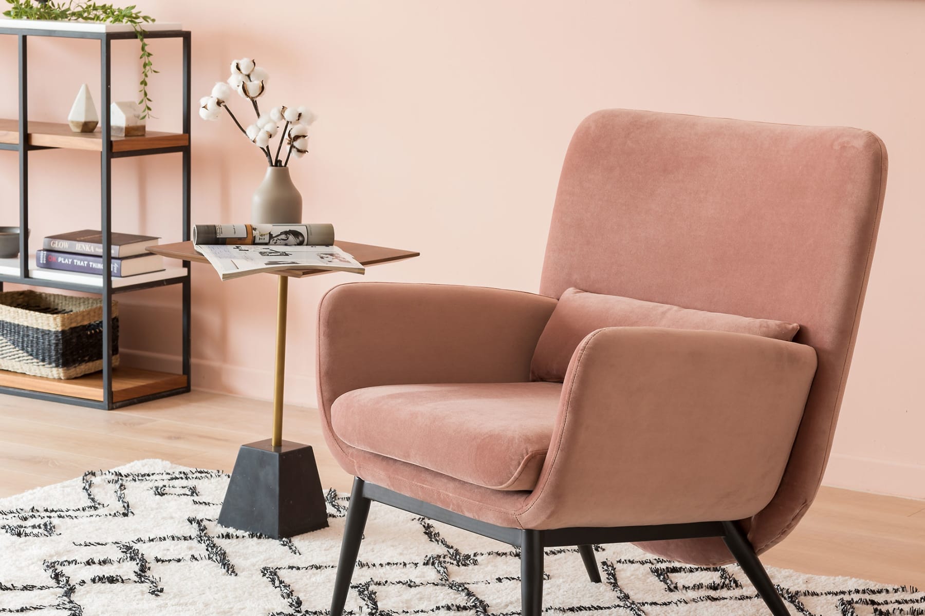 Velvet blush coloured armchair with lumbar cushion