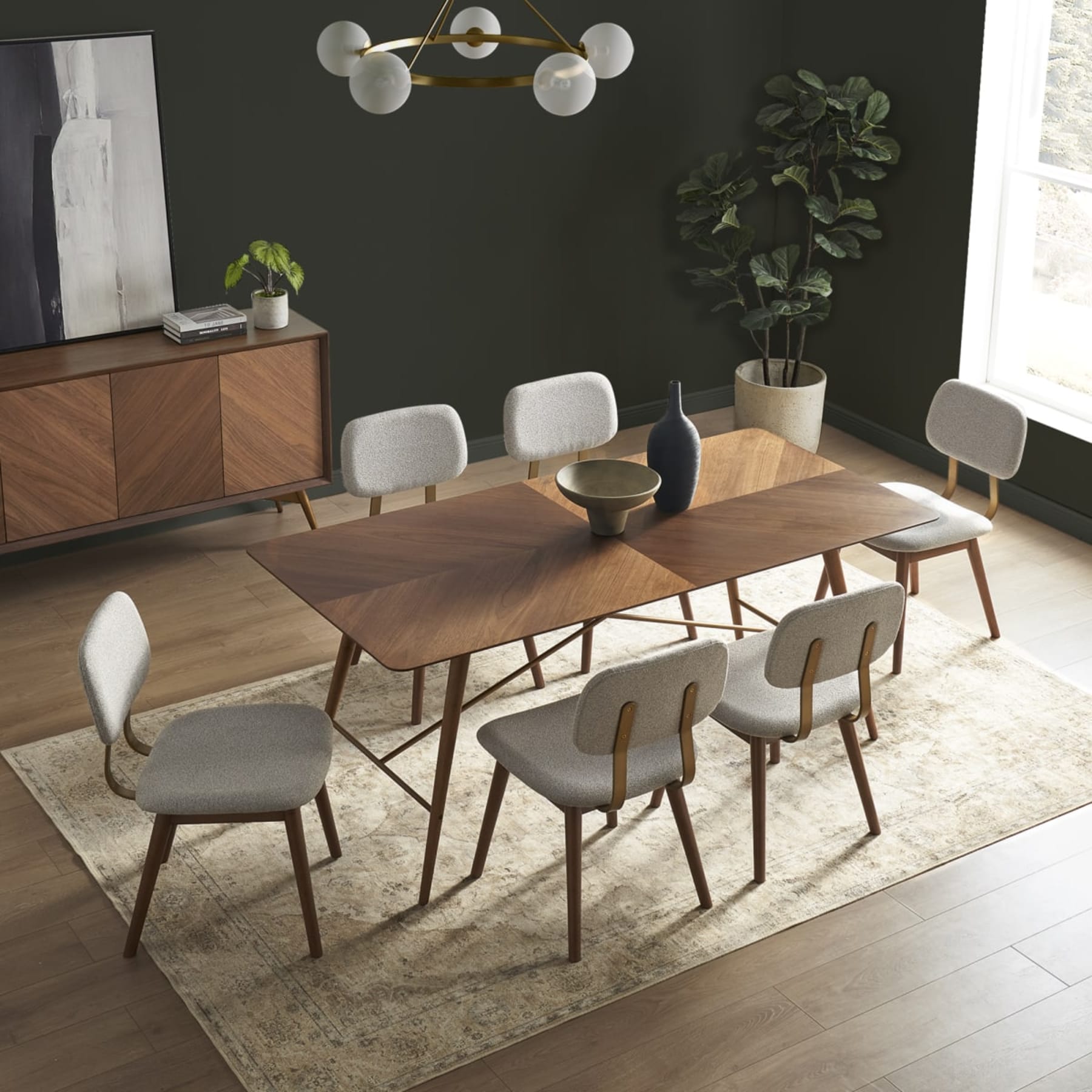 Mid-century modern dining table styled with a grey rug