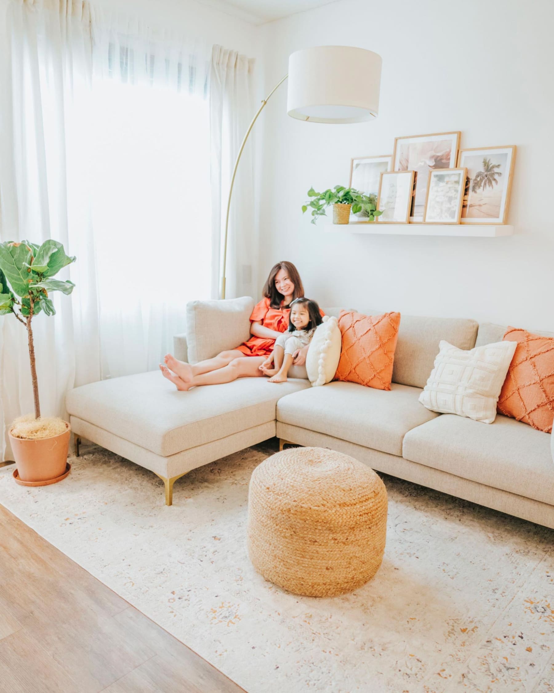 Mother and child spending time on a modern contemporary sofa