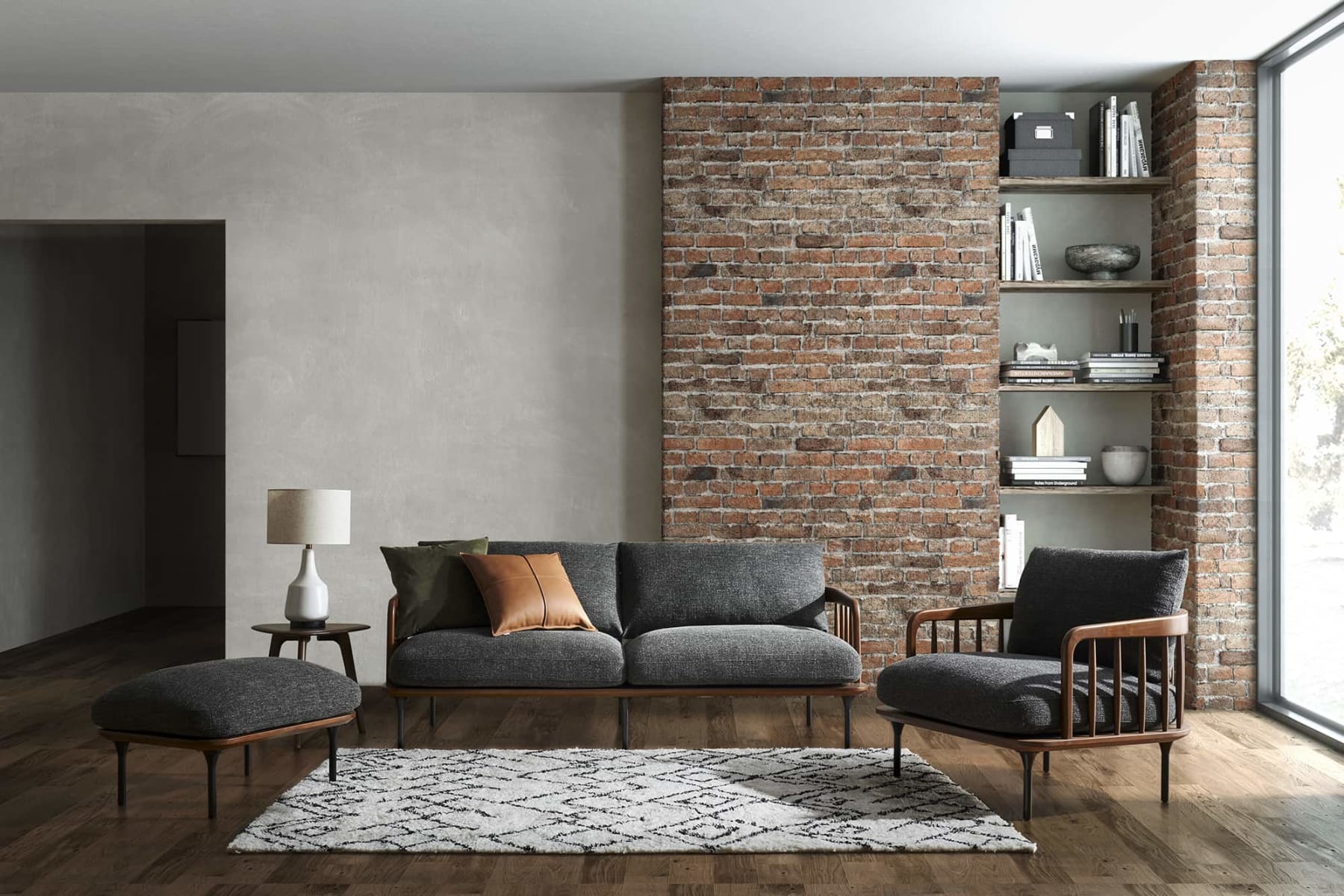 Living room with charcoal sofas and a white geometric patterned rug