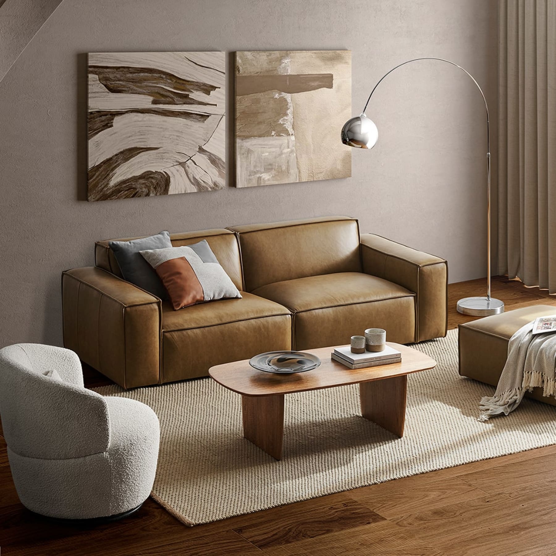 A leather sofa with an ottoman complements the hardwood floors and wooden coffee table.