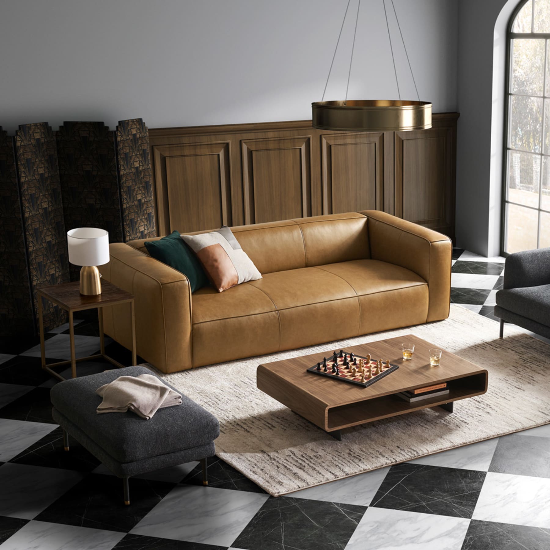 A leather sofa that provides a natural yet luxurious vibe to the living room.