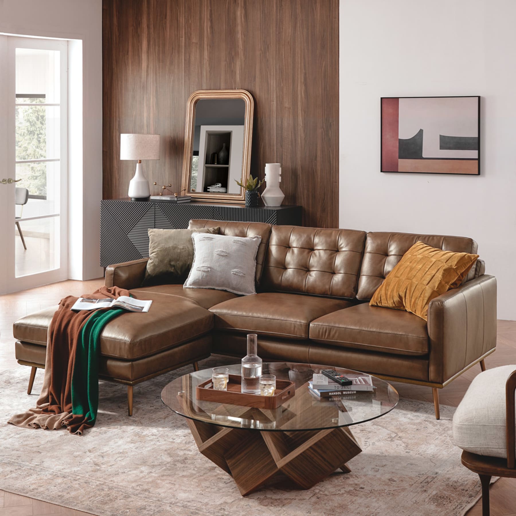 A grid tufted leather sofa that creates a mid-century modern look and feel.