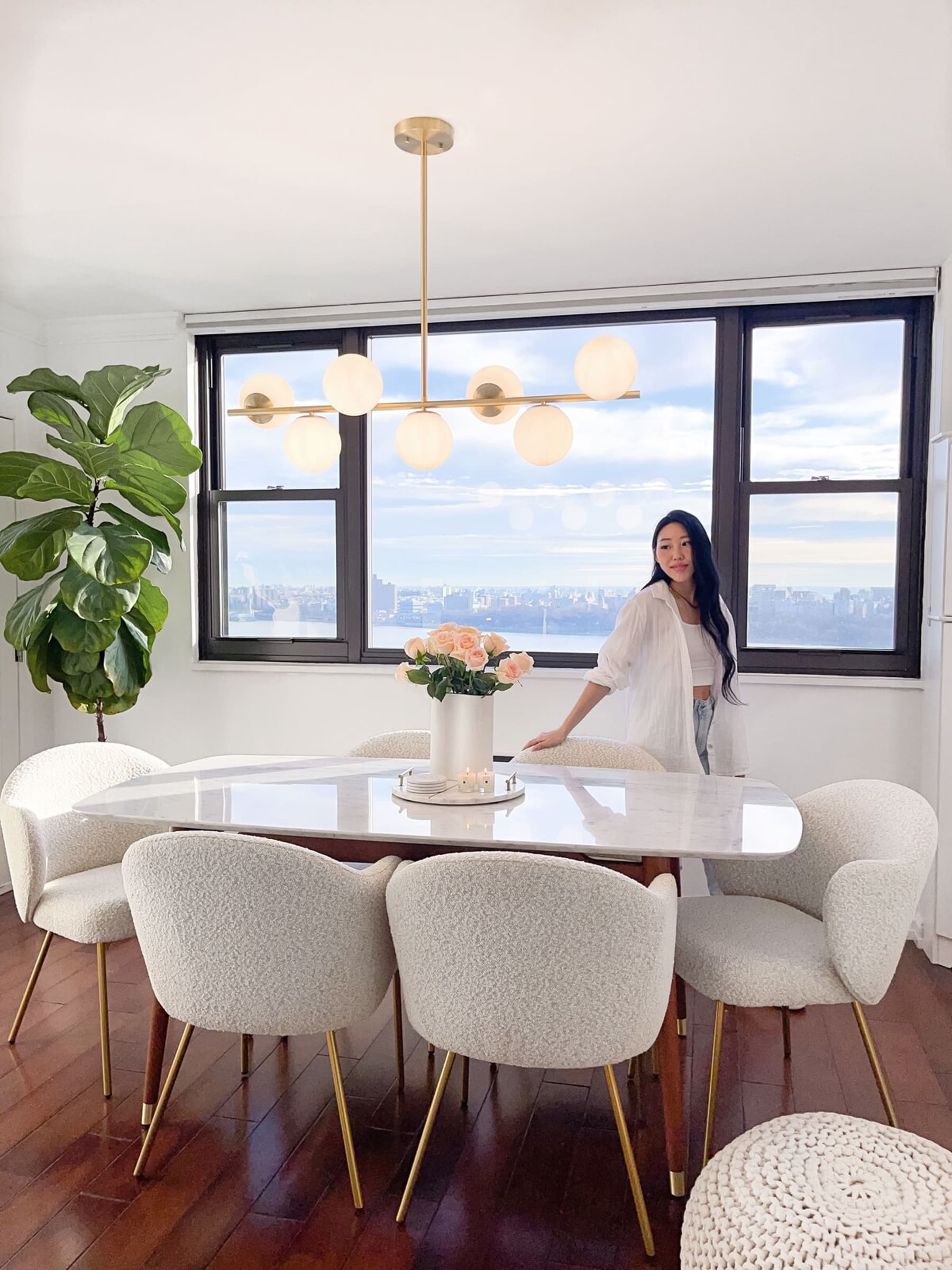 A marble dining table and 6 performance boucle chairs.