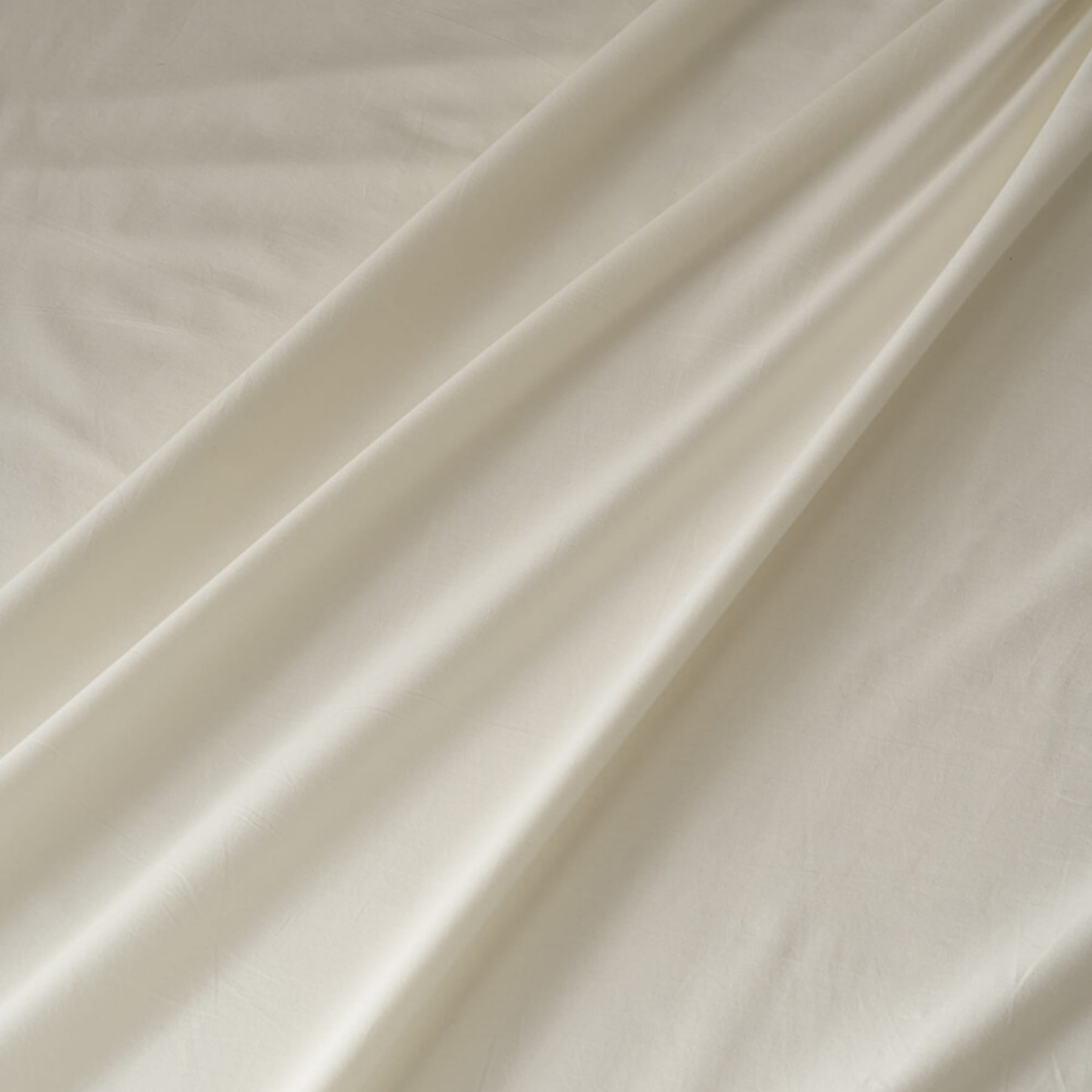 A close-up shot of a percale bed sheet.