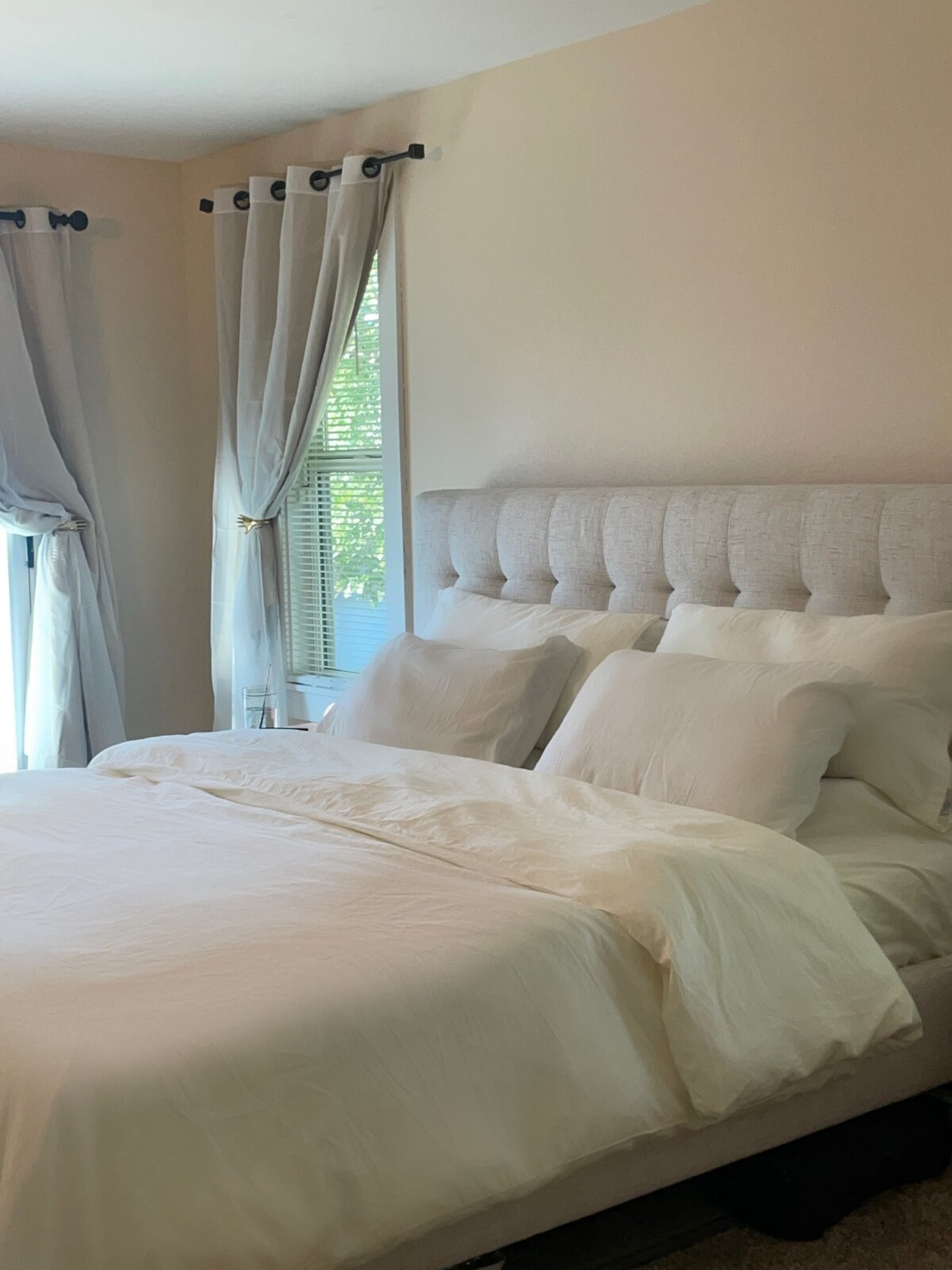 A white sateen duvet set with matching pillowcases.