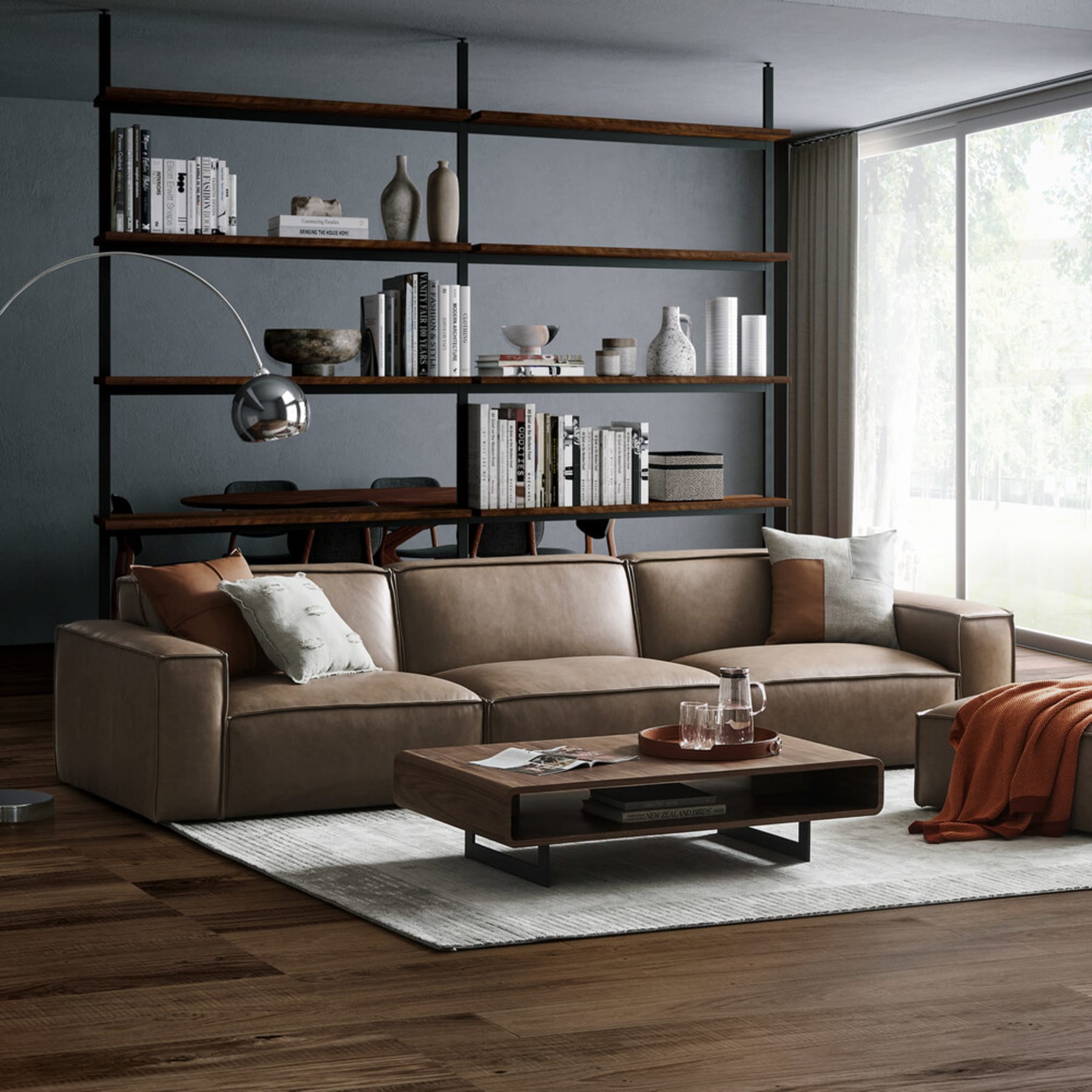 Low profile brown leather sofa and ottoman