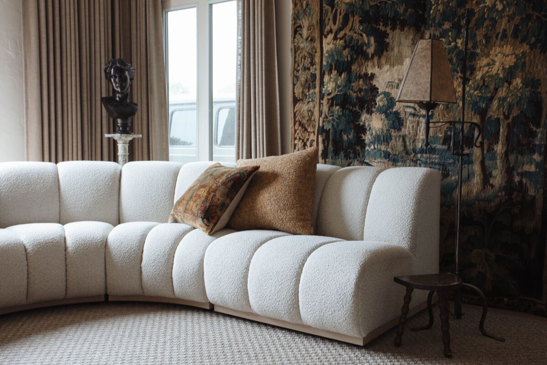 A modern performance fabric sofa mixed with several vintage elements.