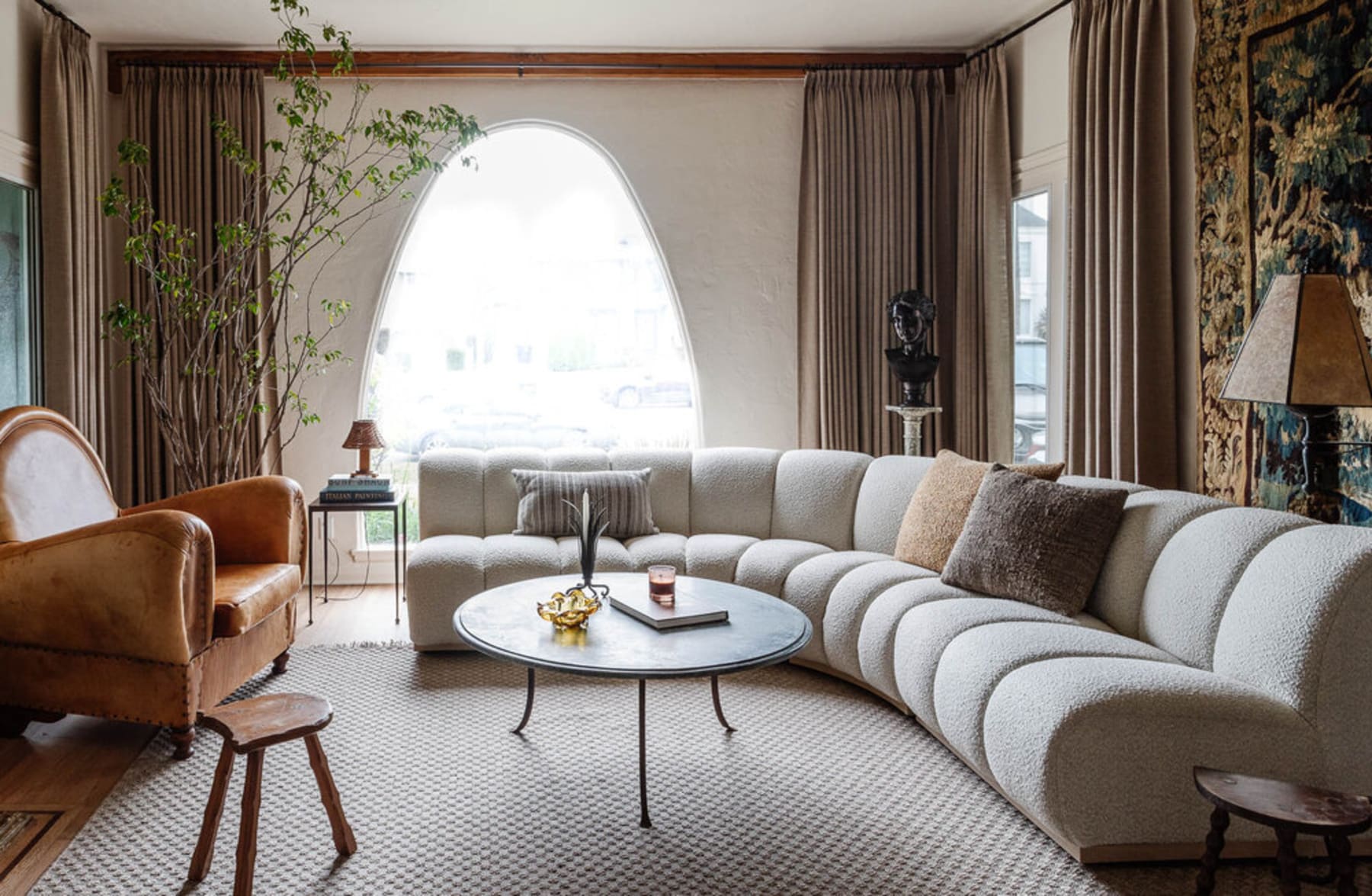 A modern performance fabric sofa mixed with several vintage elements.