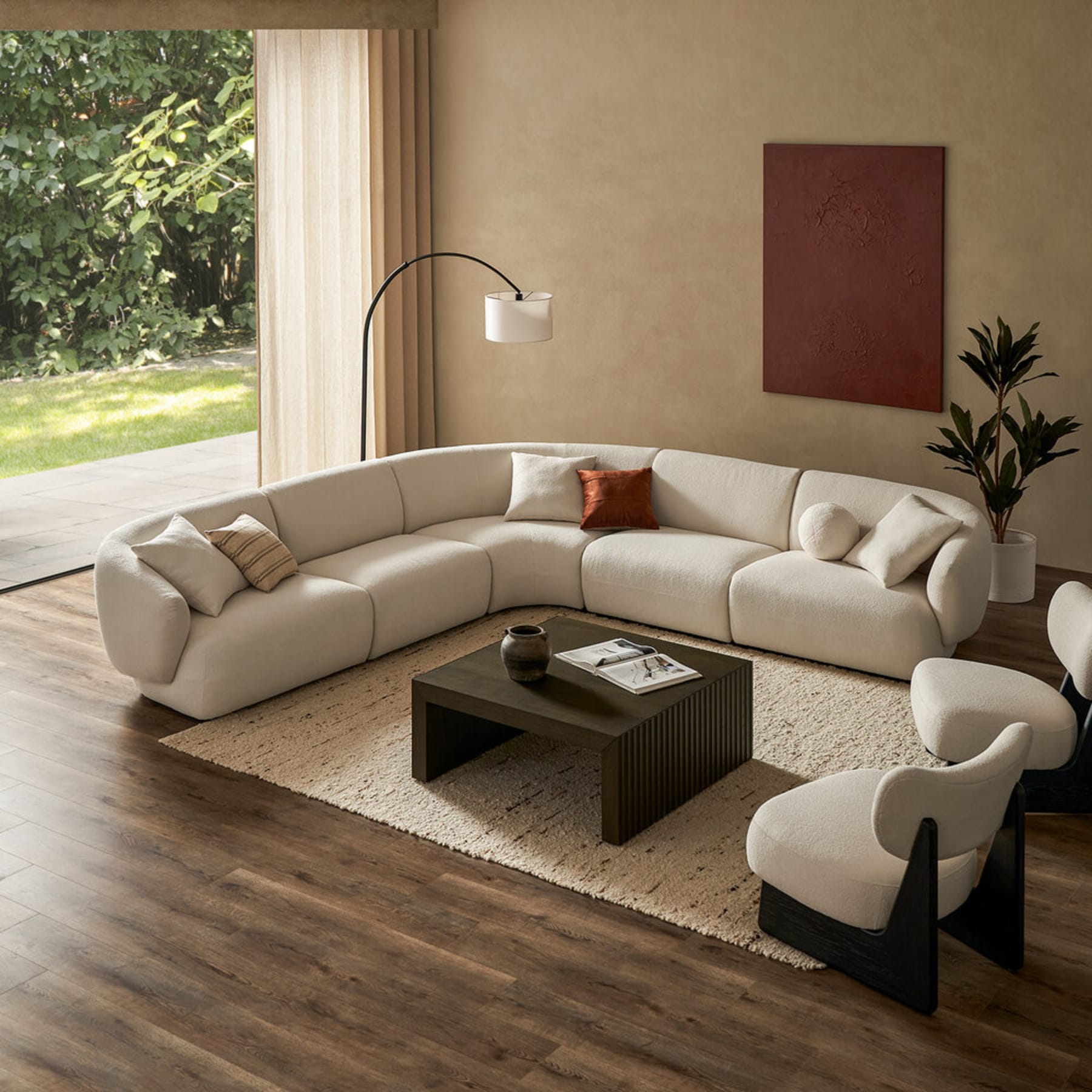 A performance fabric modular sofa arranged to form an extended L-shape.