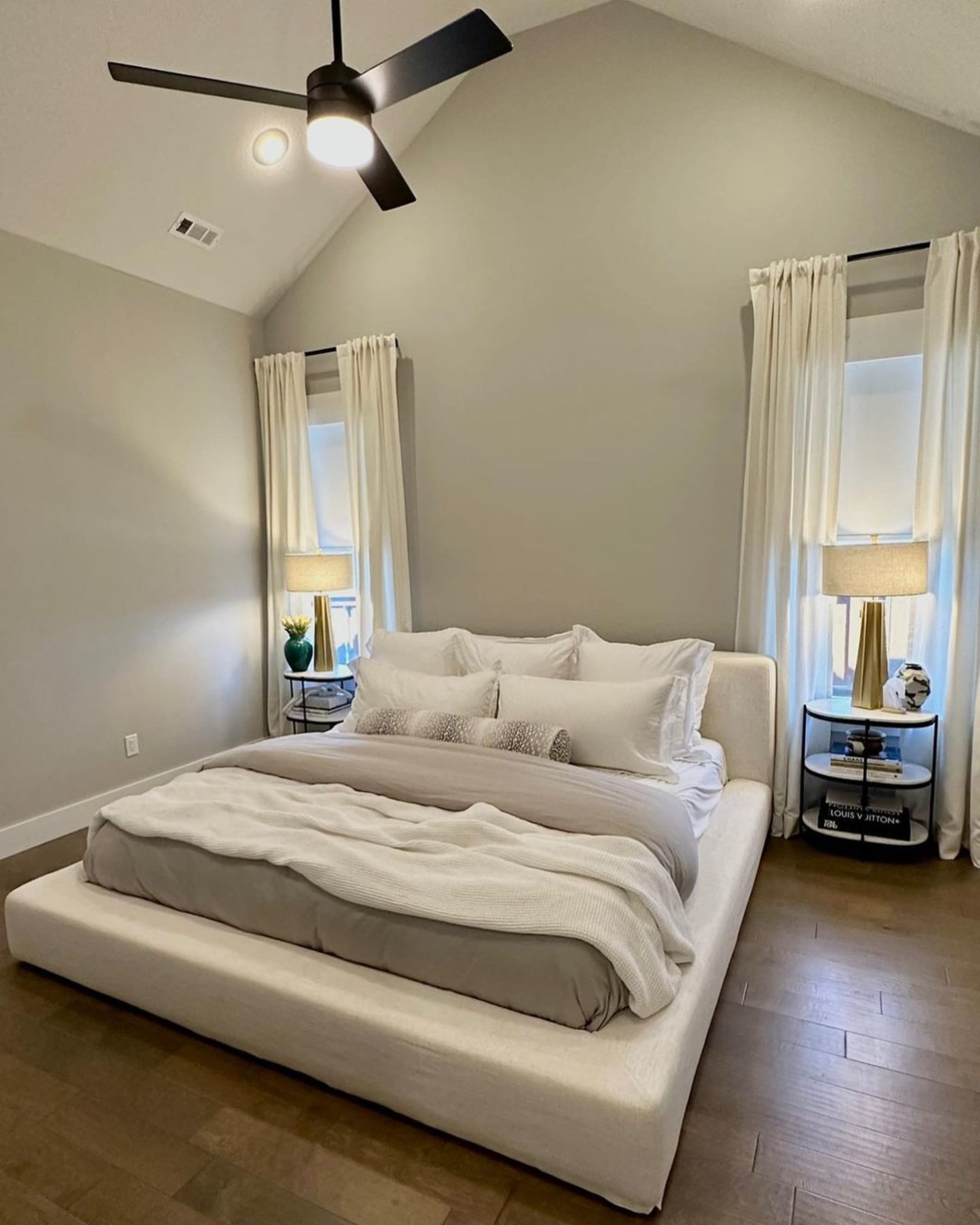 A platform bed with a matching bedding, duvet, and pillow set.