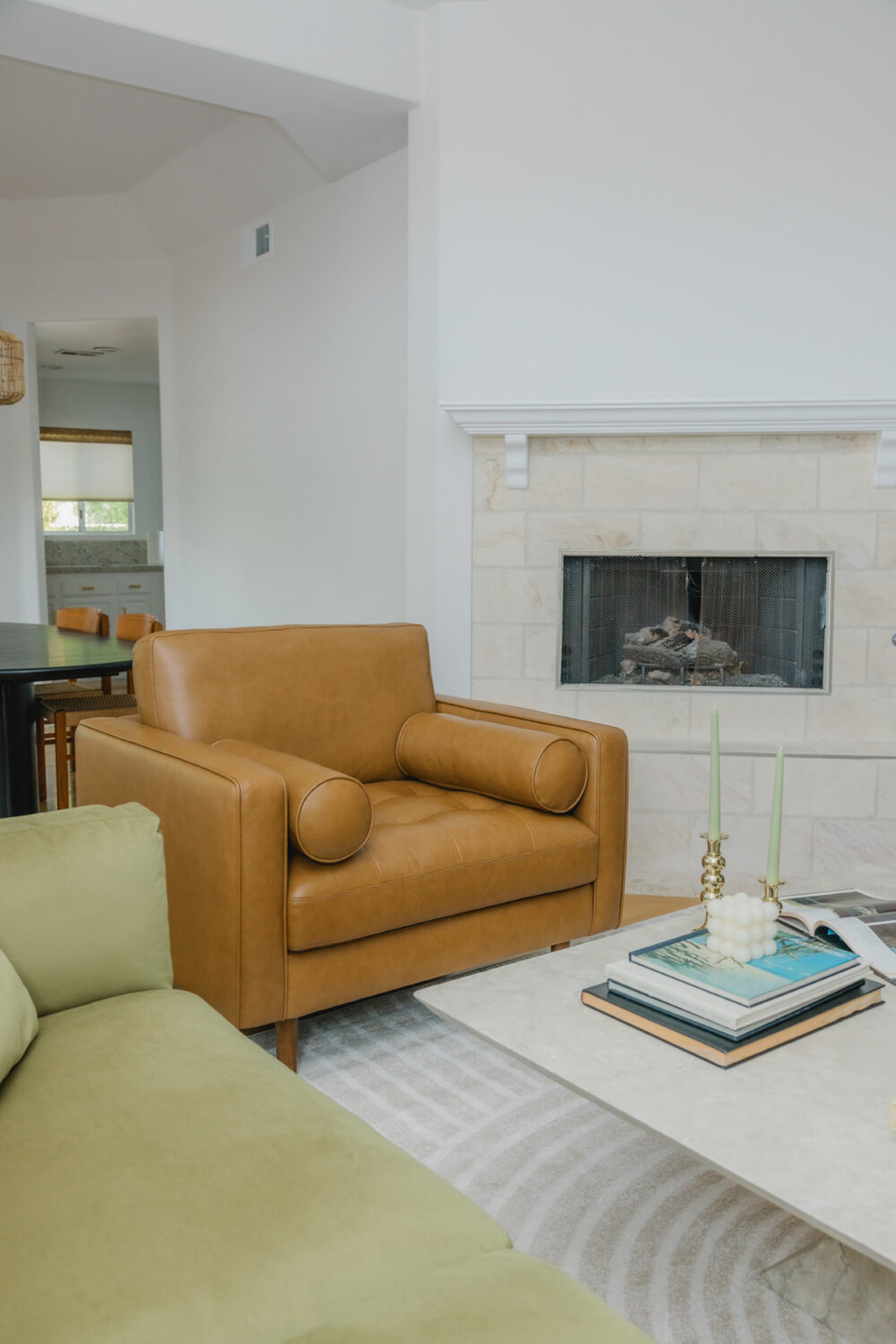 A leather sofa with tufted seats