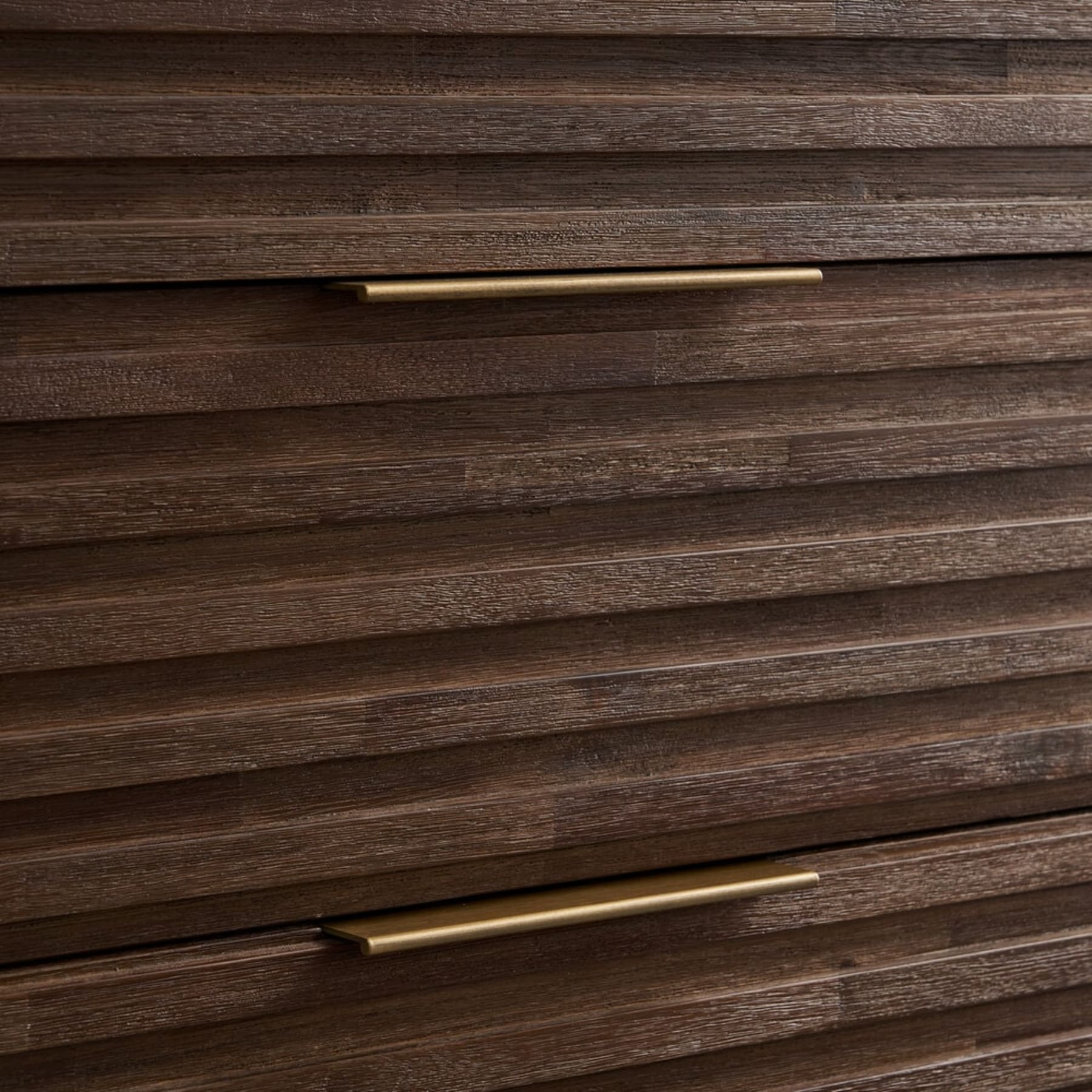 A close up shot of a dresser with fluted timber.