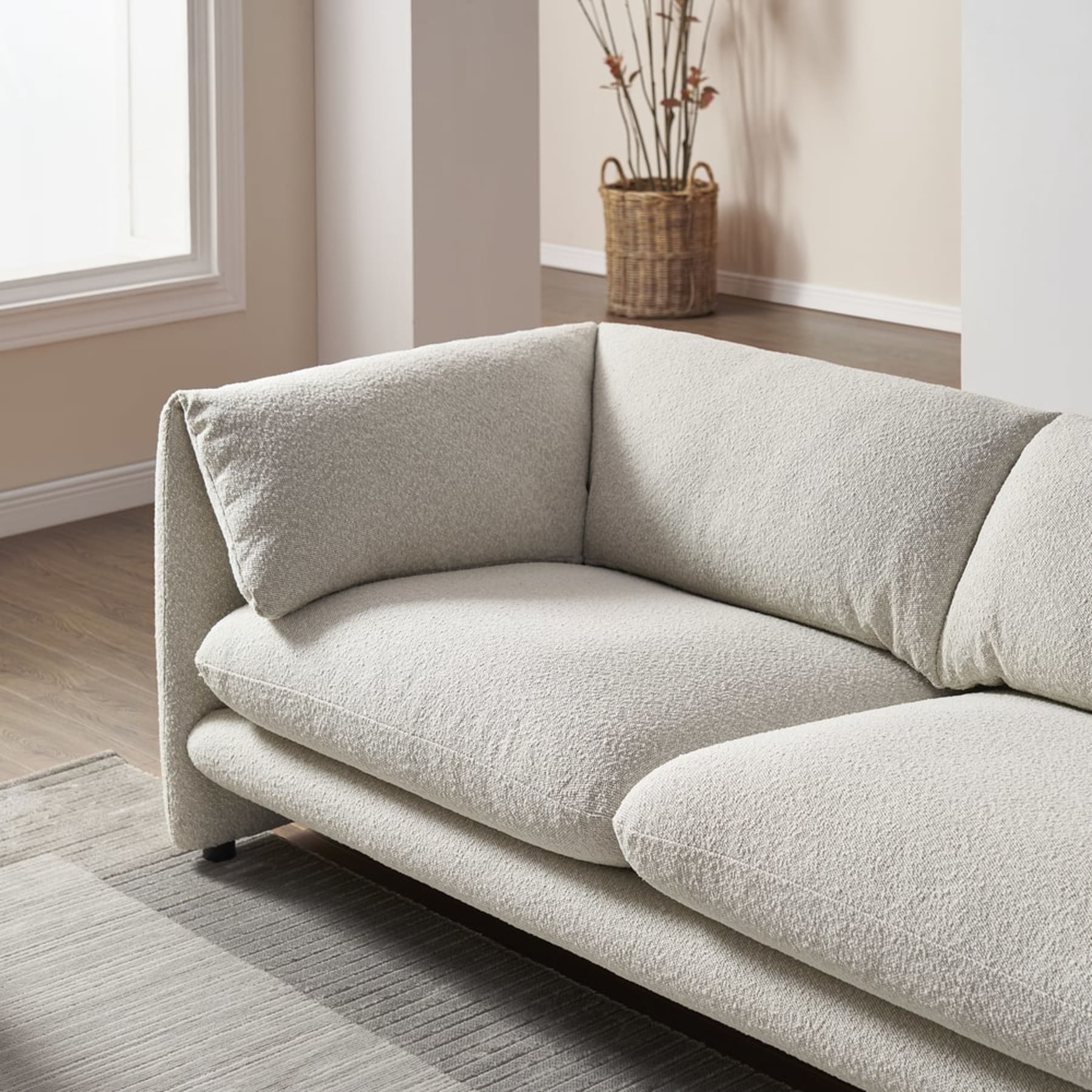 A close up shot of a leather sofa with tufted backrests