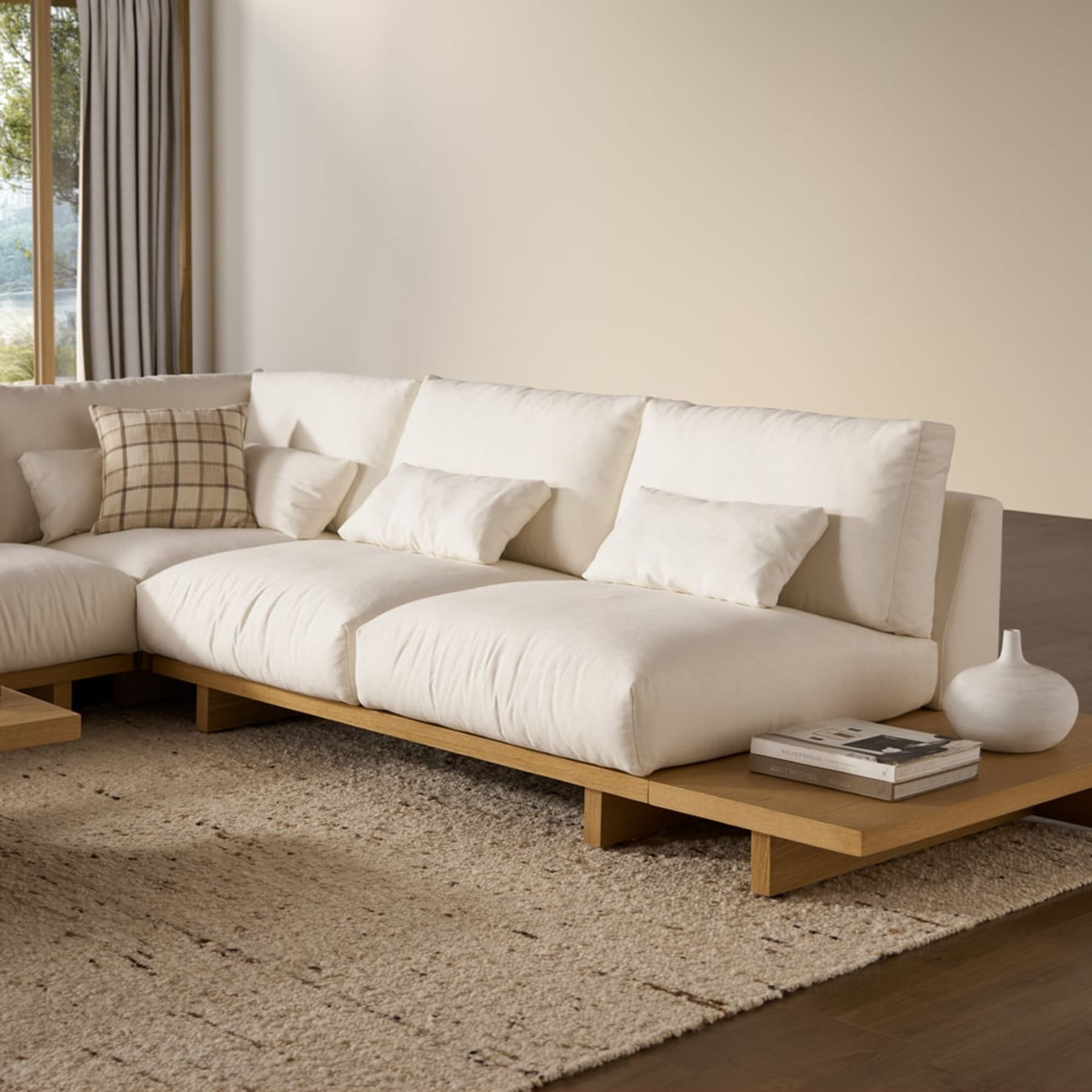 A matching side table placed beside an L-shape sectional sofa.