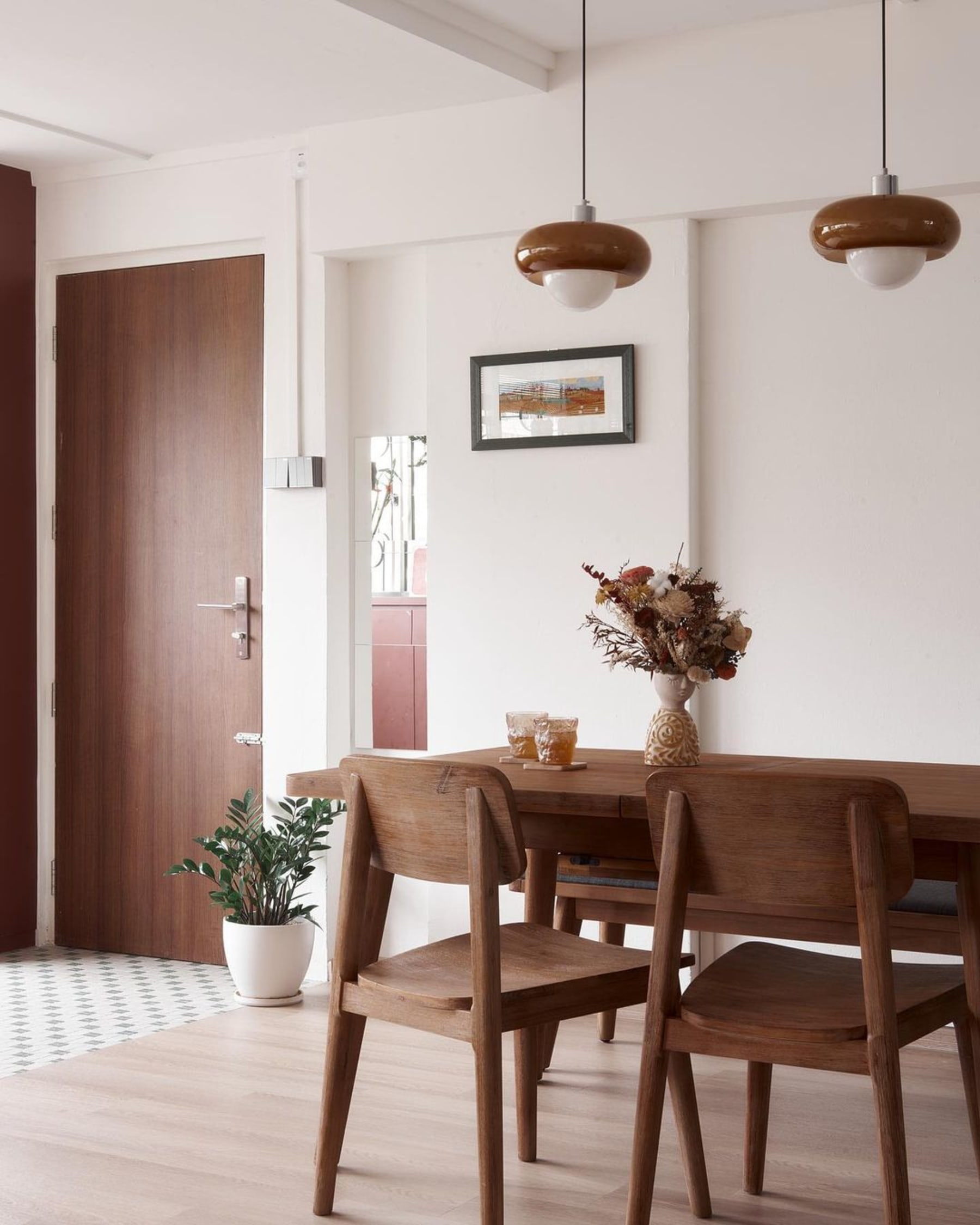 A wooden dining with a matching chair and bench.