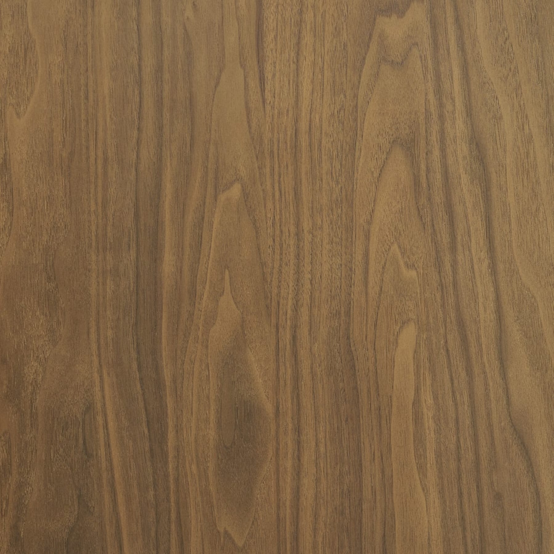 A close-up shot of American walnut veneer.