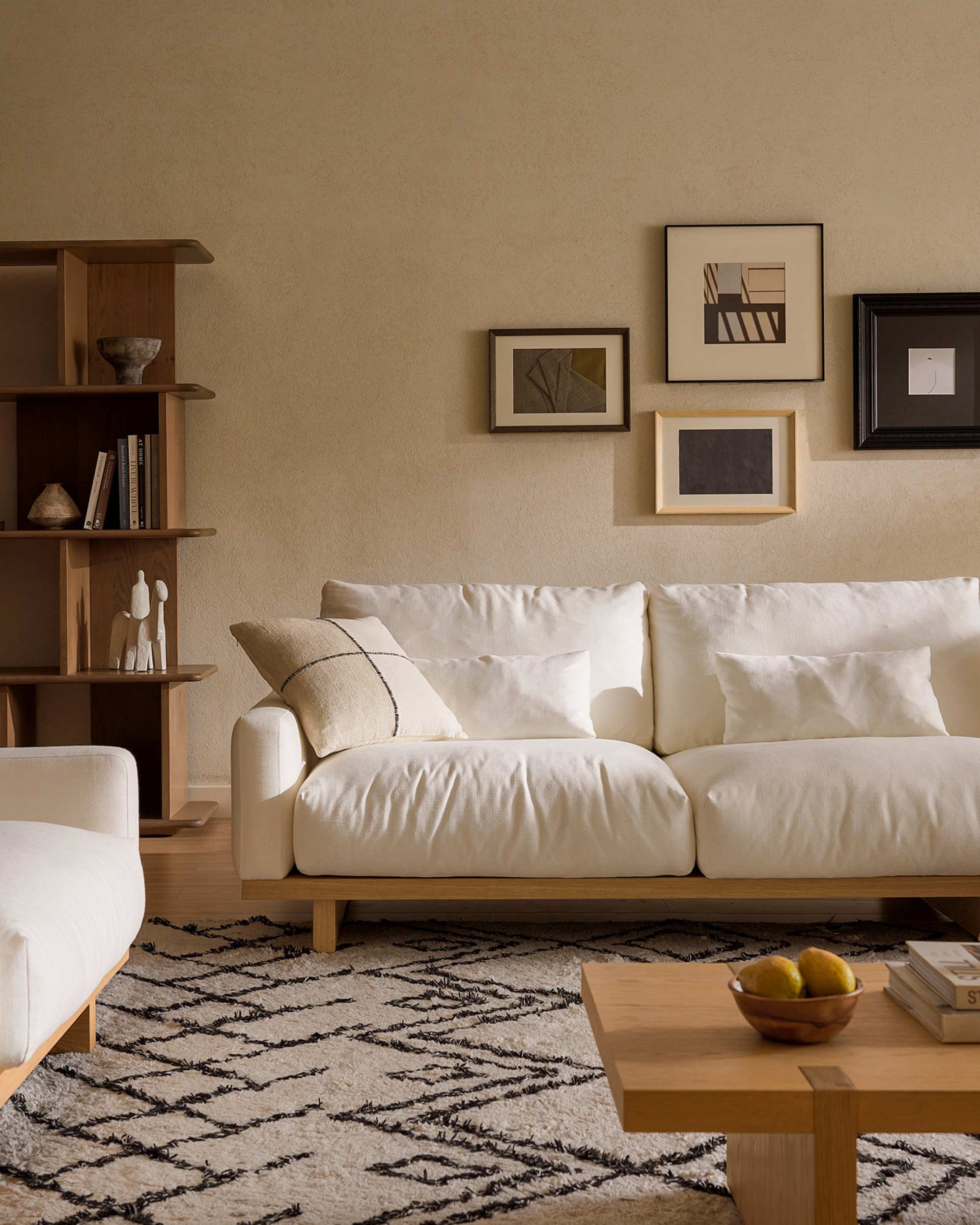 A white sofa in a living room.
