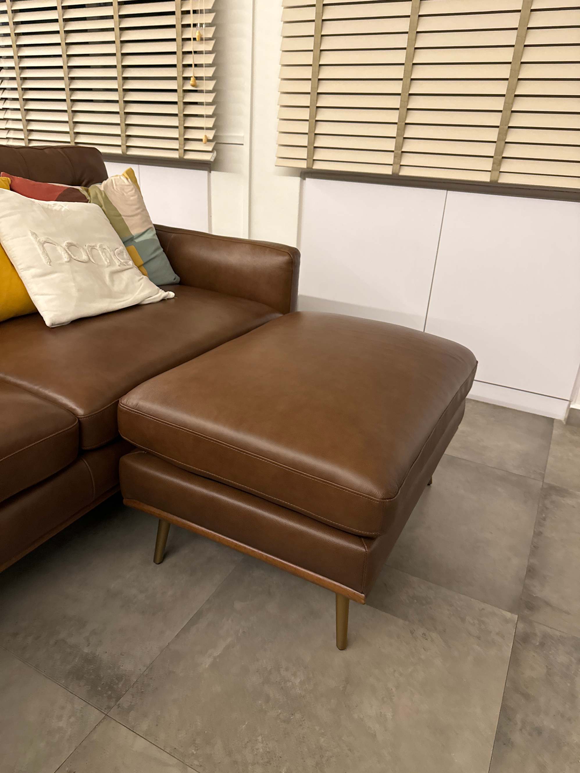 Issac leather ottoman
