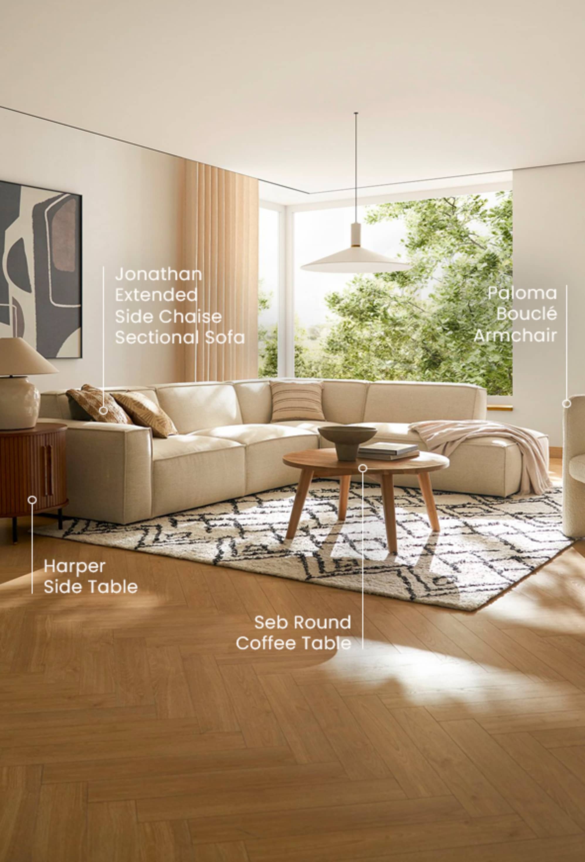 The Jonathan Extended Side Chaise Sectional Sofa in performance fabric, paired with the Paloma Bouclé Armchair, Seb Round Coffee Table and Harper Side Table in a cozy, sunlit living room