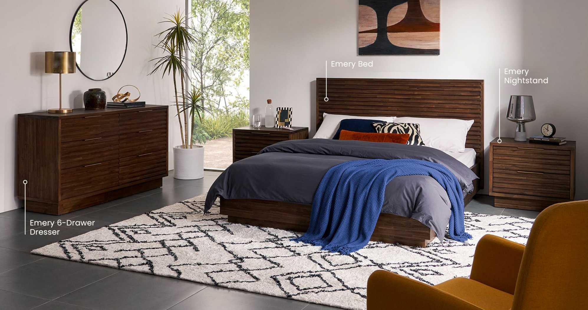 The Emery Bed and Emery Nightstands, paired with the Emery 6-Drawer Dresser and Aziza Area Rug, in a cozy bedroom