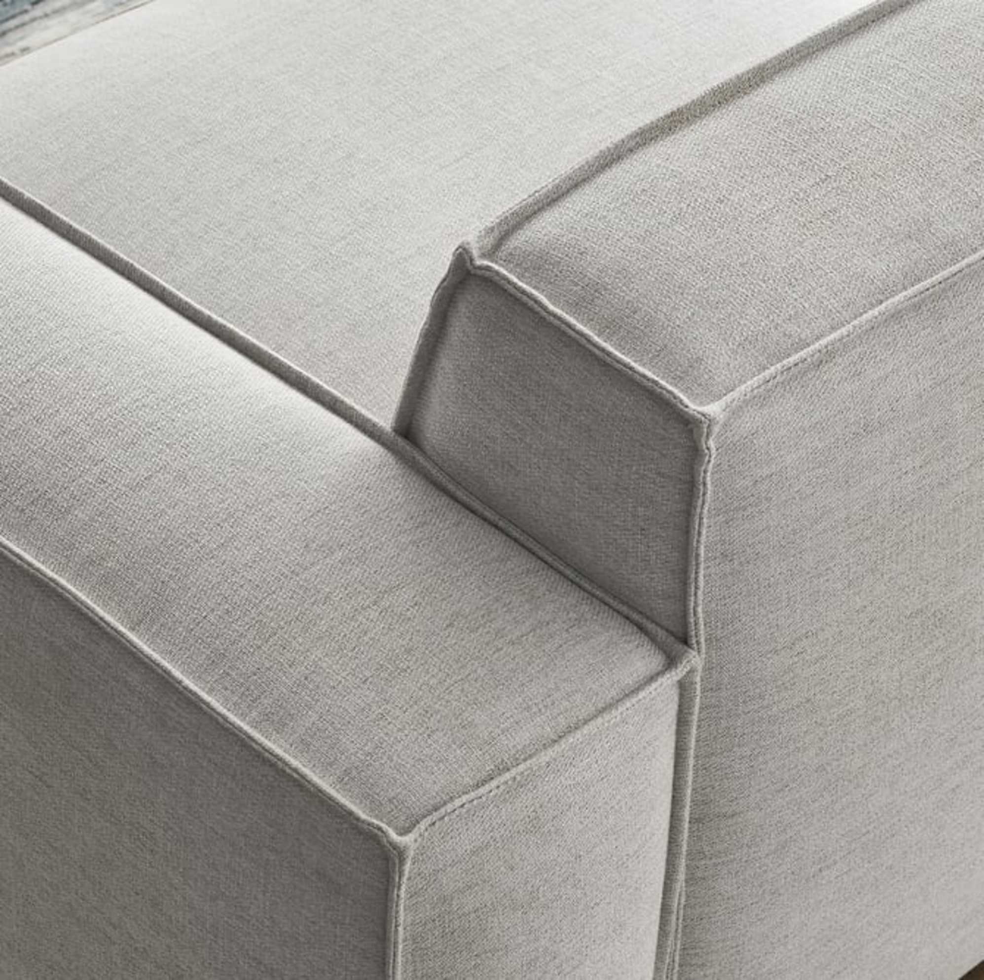 A close-up of flange seam detail on a sofa.