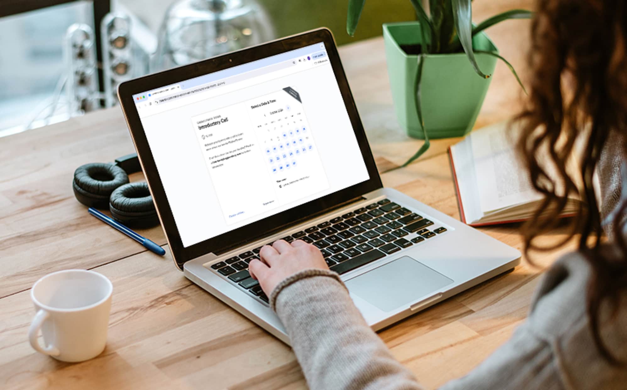 Step 1: Interior styling consultation booking page on a laptop