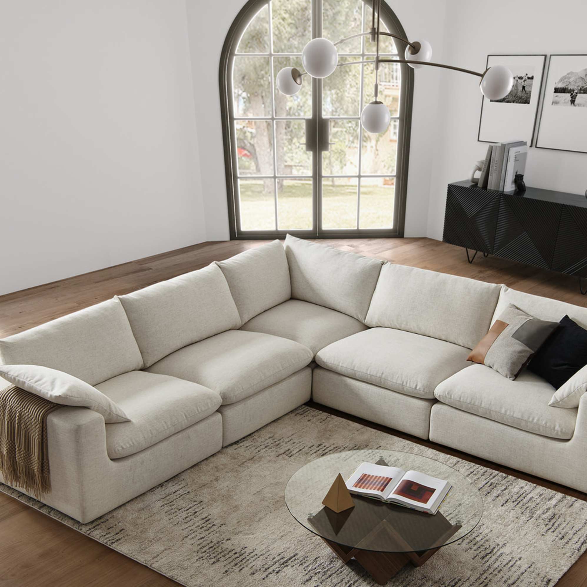 A l-shape sectional sofa in a living room.
