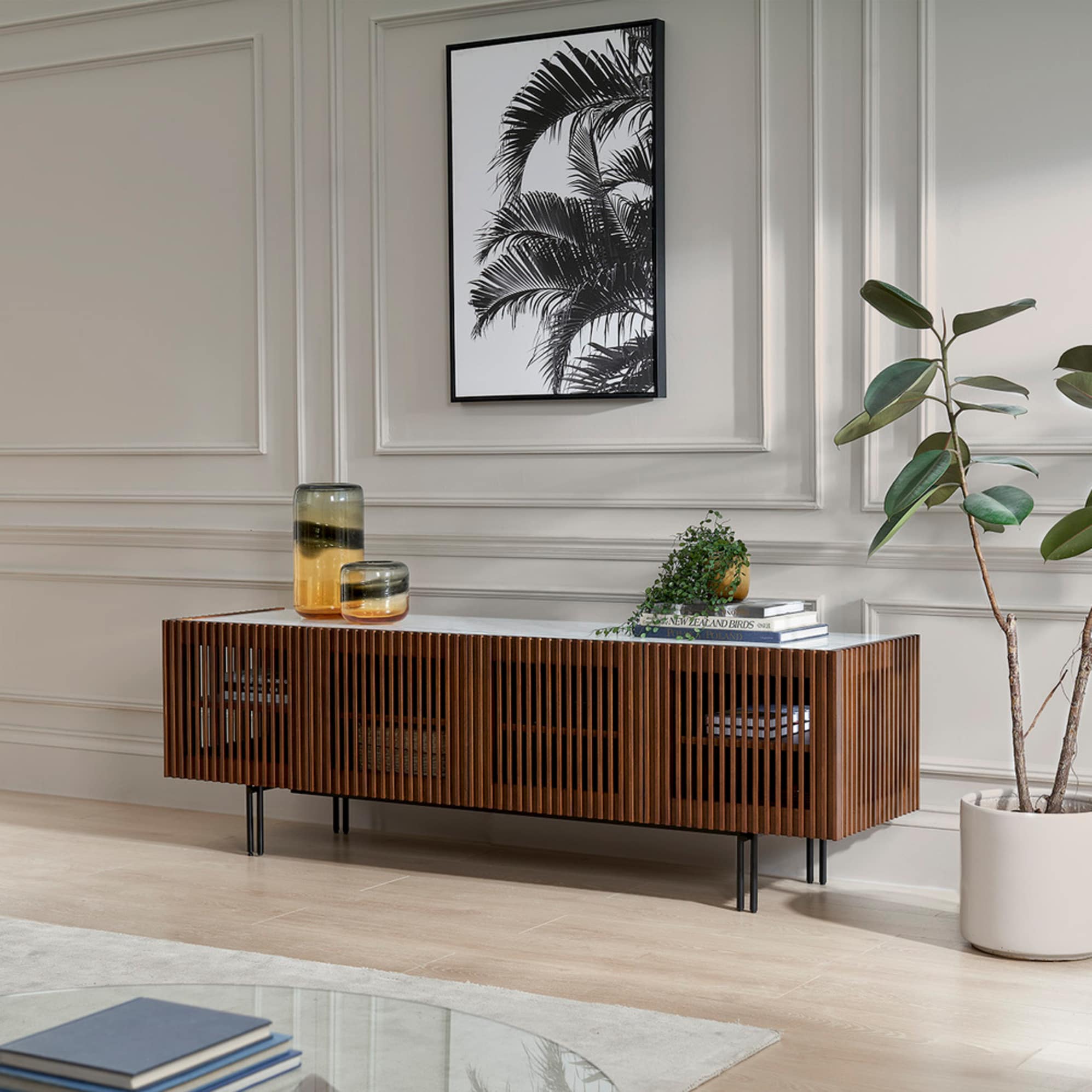 A TV stand with a Carrara marble top.