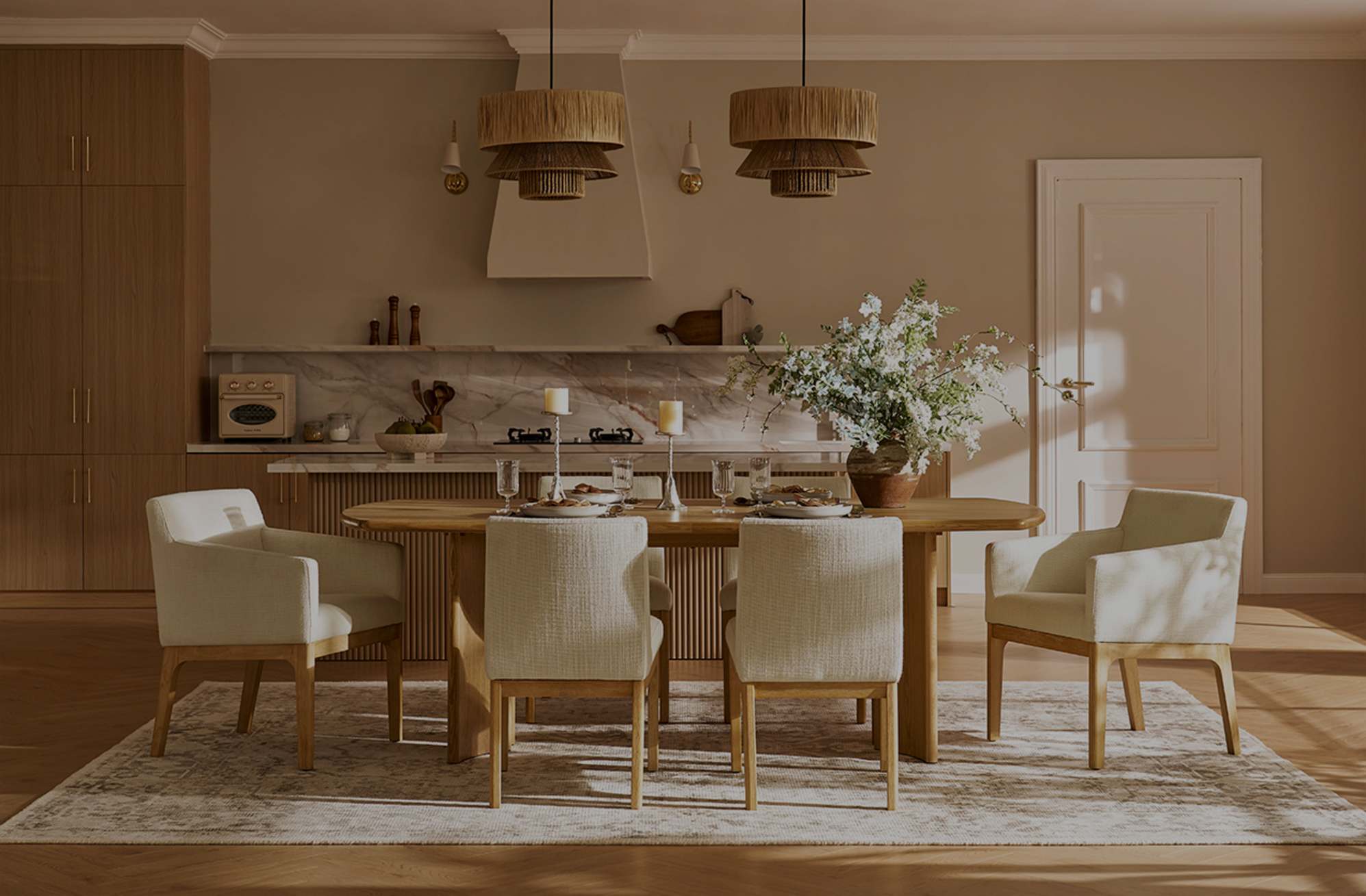 A dining table and complementing dining armchairs.