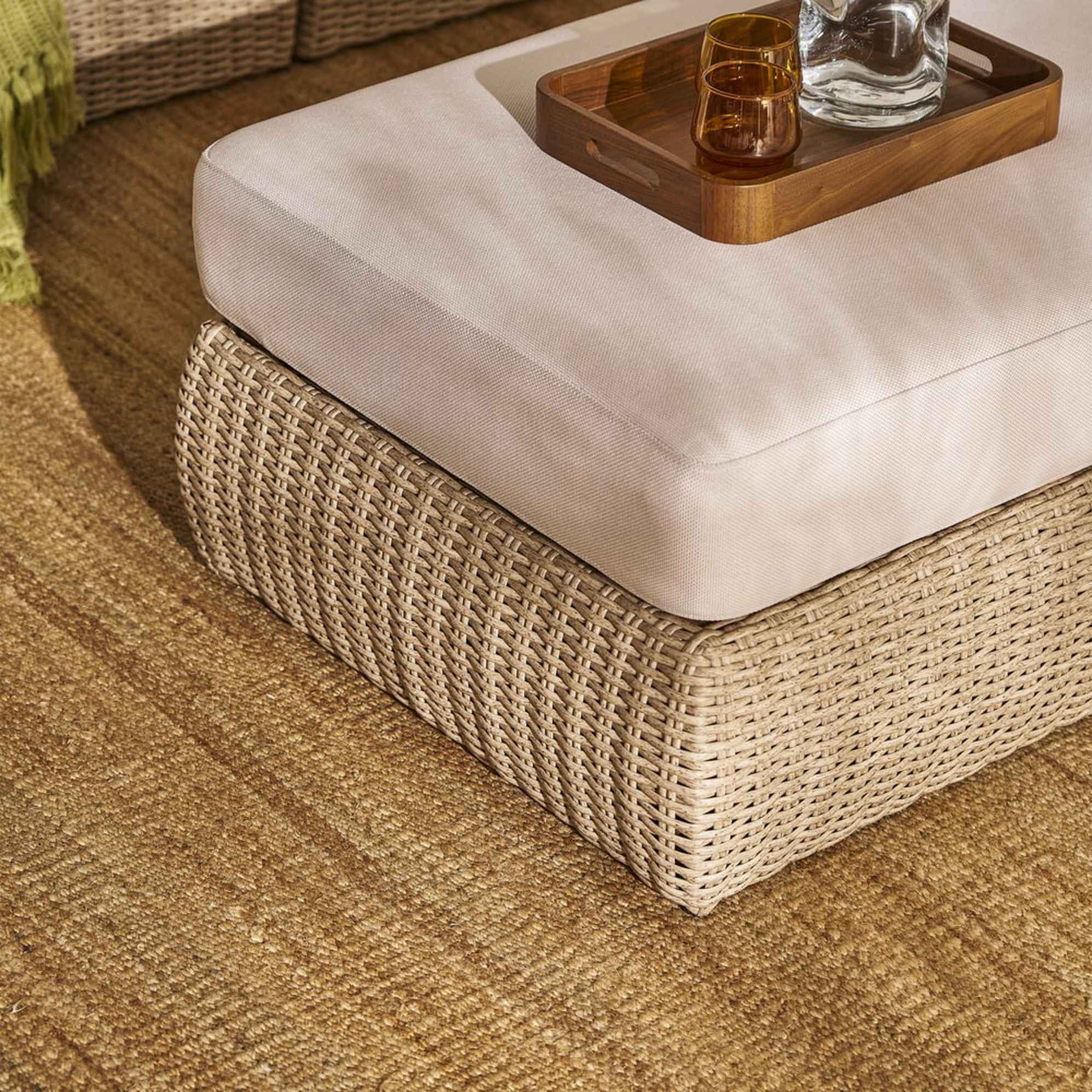 A close-up shot of an outdoor ottoman.