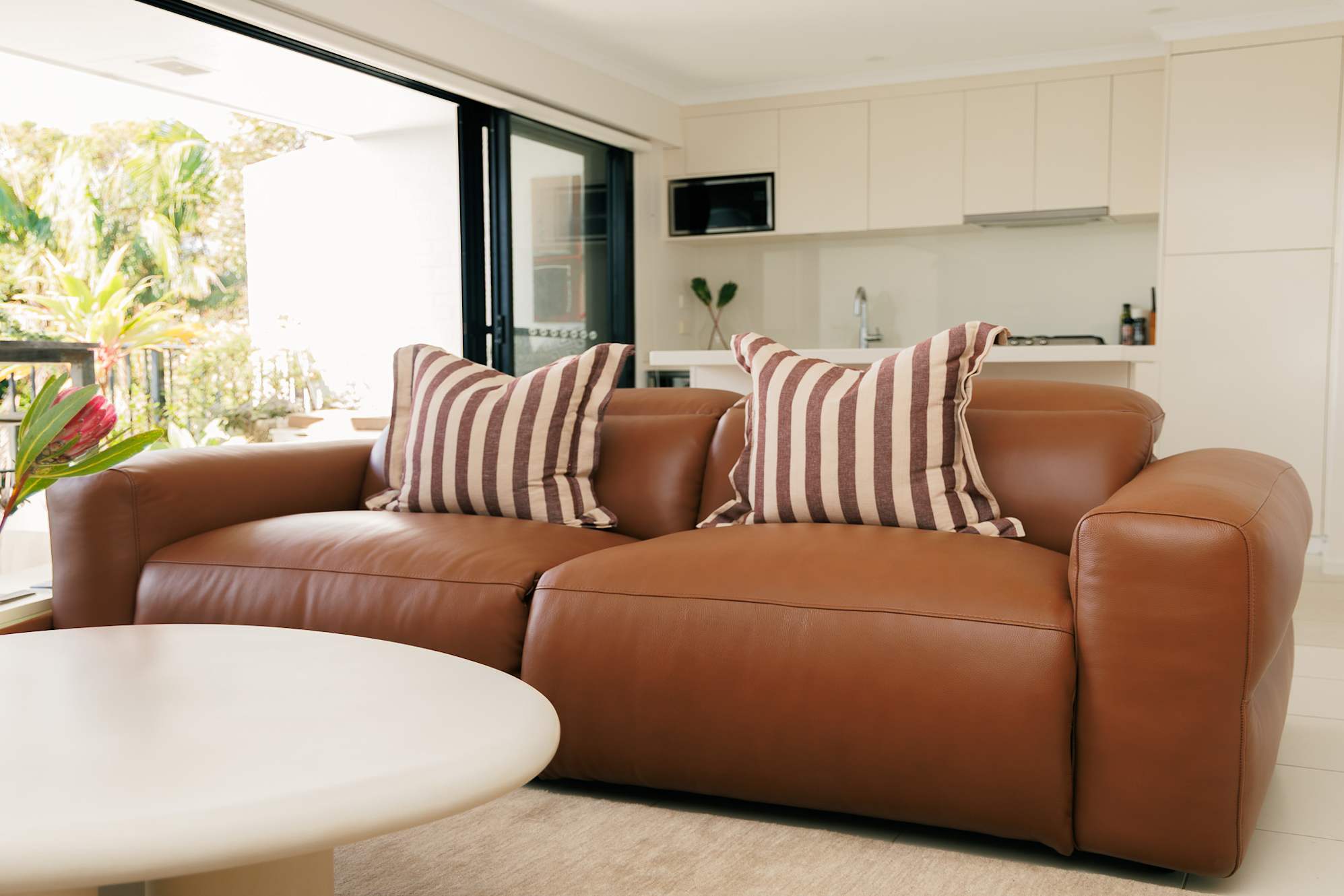 A leather recliner sofa.
